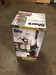lot 43 image: Shark Navigator Lift-Away Self-Cleaning Brushroll Upright Vacuum    Customer Returns See Pictures
