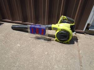 Ryobi gas powered blower. Used condition. Tested & works. As shown.
