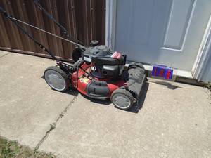 Troy Bilt self propelled mower. Looks in good shape. Tested & works. As shown.