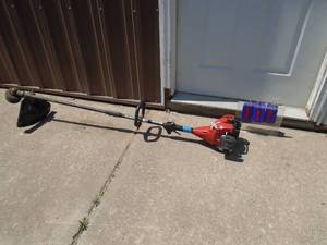 Homelite 2 cycle trimmer. Lightly used. Tested & works. As shown.