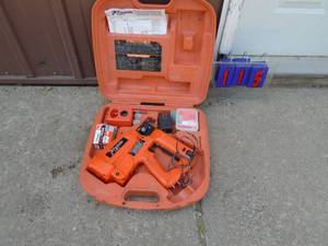 Paslode nailer. Works but needs gas cartridges. As shown.