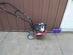 Southland mini tiller. Used condition. Tested & works. As shown.