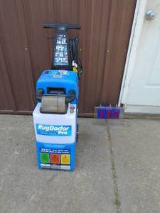 Rug Doctor shampoovac machine. Clean unit. Tested & works. As shown.