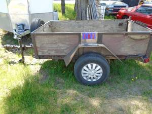 Home made trailer. 84 x 50 box with tie downs. All 3 tires look nearly new. Pulls nice. No title or plate. THIS ITEM HAS A RESERVE.