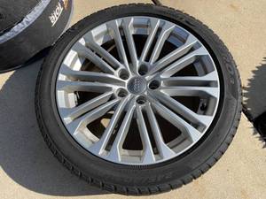 lot 52 image: 4 Sottozero Tires With Rims 245  40R18 and Storage Wraps