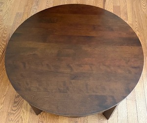 lot 9 image: Crate and Barrel Circular Wooden Table