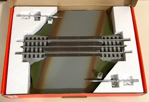 lot 94 image: Lionel Fastrack 6-12052 Grade Crossing with Flashers