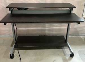 lot 133 image: Two Level Desk on Casters with Removable Laboratory 29 Keyboard Slide and Humanscale Monitor Bracket