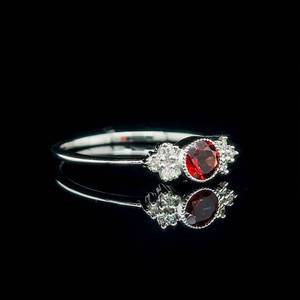lot 27 image: 0.41 Carat Garnet & Diamond Round Halo Cluster Bow Tie Ring in White Gold $1,800 Retail