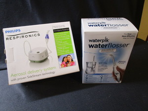 lot 247 image: Respironics, Flosser