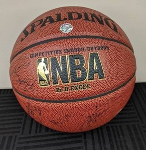 lot 5 image: NBA Minnesota Timberwolves Autographed Basketball Kevin Love and Team