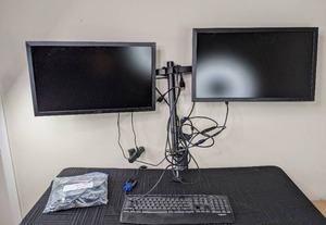 lot 39 image: Set of 2 ViewSonic Computer Monitors with Display Mount, Logitech Keyboard and Cords