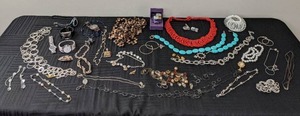 lot 49 image: One of a Kind Assortment of Earrings, Watches and Necklaces