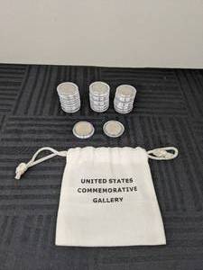 lot 30 image: (25) US Nickels with Protective Coin Capsules and Drawstring Bag