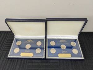 lot 24 image: 2006 and 2008 Commemorative State Quarters with Boxed Displays