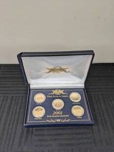 lot 28 image: 2001 Commemorative Gold State Quarters with Boxed Display