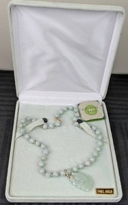 lot 18 image: Necklace 14K Gold and Chinese Jade Natures Gift Bead Strand with Fish Enhancer