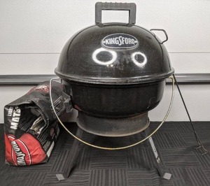 lot 90 image: Kingsford 14 Kettle Grill with Hinged Lid and Partial Bag of Kingsford Charcoal