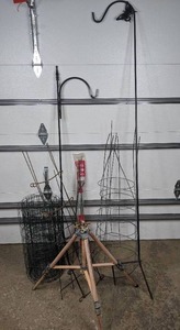 lot 92 image: Assortment of Gardening Supplies Sprinklers, Plant Hangers, and More