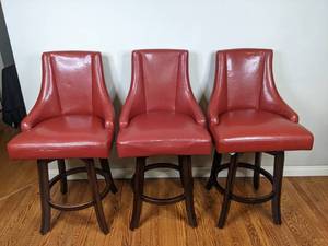 lot 69 image: Set of Three Retro Red Swivel Stools