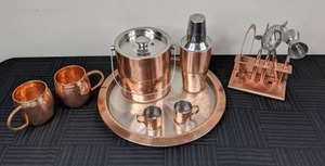 lot 74 image: Barrel Shaped Hammered Texture Mugs, Bar Ware Shaker, Round Tray, Ice Bucket and 6 Pc. Cocktail Utensils Bar Tool Set