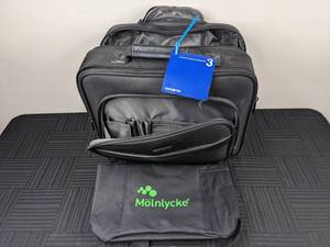 lot 70 image: Samsonite Luggage Bag with Wheels and Small Molnlycke Bag