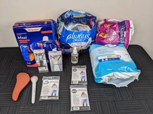 lot 127 image: Feminine Products, Emergency Rain Ponchos, No 7 Serum and More