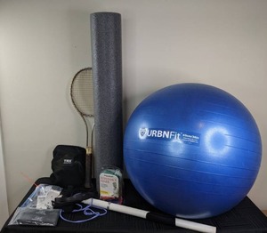 lot 135 image: Assorted Small Exercise Items - Urban Fit Exercise Ball, Foam Roller, Thera Band Resistance Band, Timex Digital Heart Rate Monitor, and more