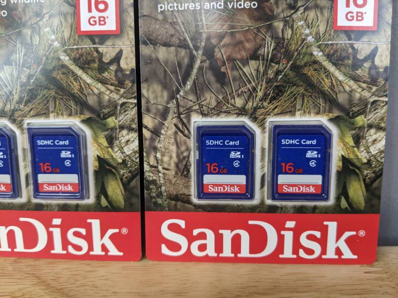 lot 49A image: 4 Brand New SanDisk 16GB SDHC Cards Mossy Oak O