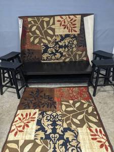 lot 95 image: Deep Brown Ikea Lack TV Stand, 2 Dalyn Rugs, and 4 Saddle Stools E