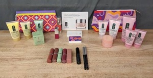 lot 60 image: New Clinique Products Moisture Surge, Lipstick, Lipgloss, Mascara, Face Wash, Lotions and More E