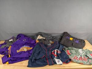 lot 130 image: Collection of Various Sized Sports Apparel  A