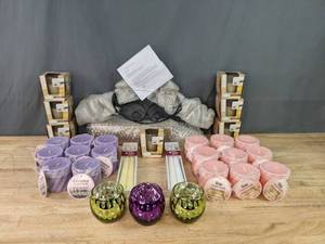lot 135 image: An Assortment of Candles and New Glass LED Votive Holder  K