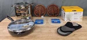lot 68 image: NEW Kitchen Items Kitchen Living Frying Pan with Glass Lid, Crofton 12 Qt Stockpot, Pair of Cutting Boards, Pair of Trivets, Oven Mitt,  Bella Electric Gravy Bowl Warmer  K