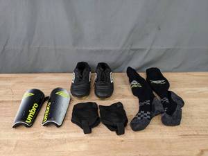 lot 159 image: Umbro Soccer Gear Youth Size 3 (Shin Guards, Stirrups, Socks, Cleats) K
