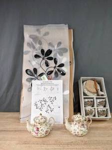 lot 149 image: (2) Victorian Trading Co Floral Teapots, Porcelain Japanese Tea Set, and Mirrored Flower Wall Decor K