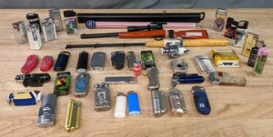 lot 135A image: Unique Lighter Collection Jack Daniels, Camel, Accordion, Fishing Pole, Gun, Playboy, Coca Cola, and More  C