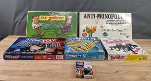 lot 182 image: Board Games Anti-Monopoly, Monopoly, Connect 4, Twister, and Uno A