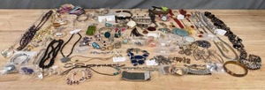 lot 55A image: Large Collection of Jewelry, Earrings, Bracelets, Necklaces, Watches, Rings, and More  A