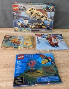 lot 51A image: New Lego Jurassic World T-Rex Dinosaur Fossil Exhibition, Lego City Ocean Diver, Lego Creator Pelican and Santa Claus  M