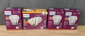 lot 228 image: NEW Philips 60W LED Lightbulbs (4 Boxes) M