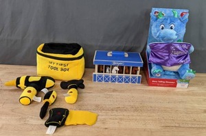 lot 131A image: NEW Festive Voice Storytelling Dragon Plush Toy, Breyer Farms Wooden Carry Stable and Plush Toy Tool Set M