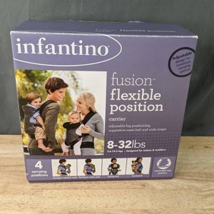 lot 123A image: NEW Infantino Baby Carrier M