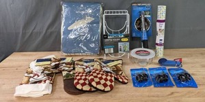 lot 199 image: NEW Home Essentials Dishtowels, Oven Mits, Ironing Board Cover, Potato Ricer, Vinyl Top Liner, Wine Stoppers & More K