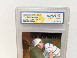 lot 39B image: WCG Graded 10 Tiger Woods 2001 Upper Deck Golf Rookie Tigers Tales Card V