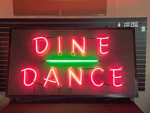 lot 5 image: Dine and Dance porcelain enamel sign from Murrays Steakhouse