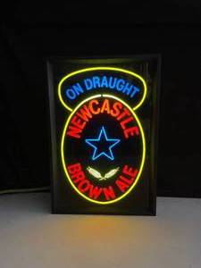 lot 37 image: Newcastle Brown Ale internally lit fluorescent sign