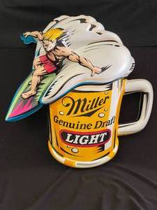 lot 150 image: Miller Genuine Draft Light surfer, vacuum-formed plastic sign, vintage, Rare