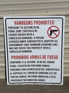 lot 165 image: Handguns Prohibited painted tin sign