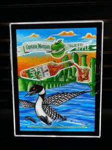lot 187 image: Captain Morgan Sliced Apple backlit LED sign with loon, NIB